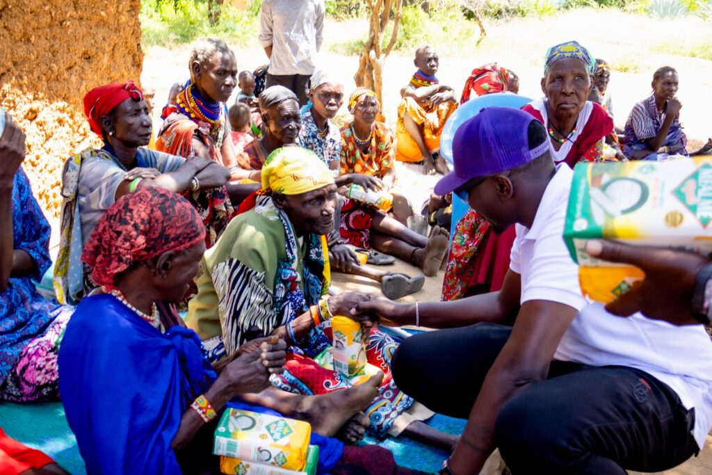 Elders receiving food packs
